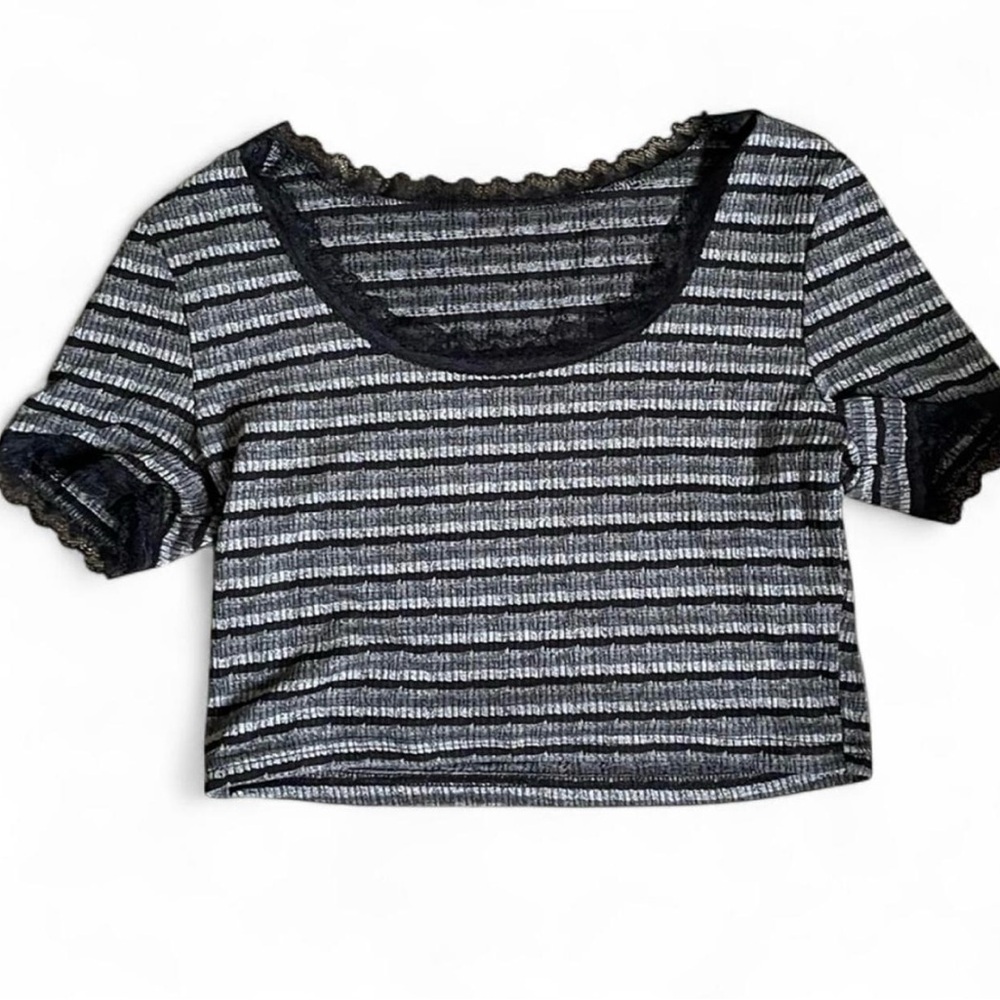 Black and gray crop top with black lace detailing.
